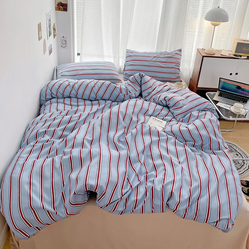 STORESDE Simple Red and Blue Striped Duvet Cover and Four Piece Bed Sheet Set with Washed Cotton Bedding on the Bed