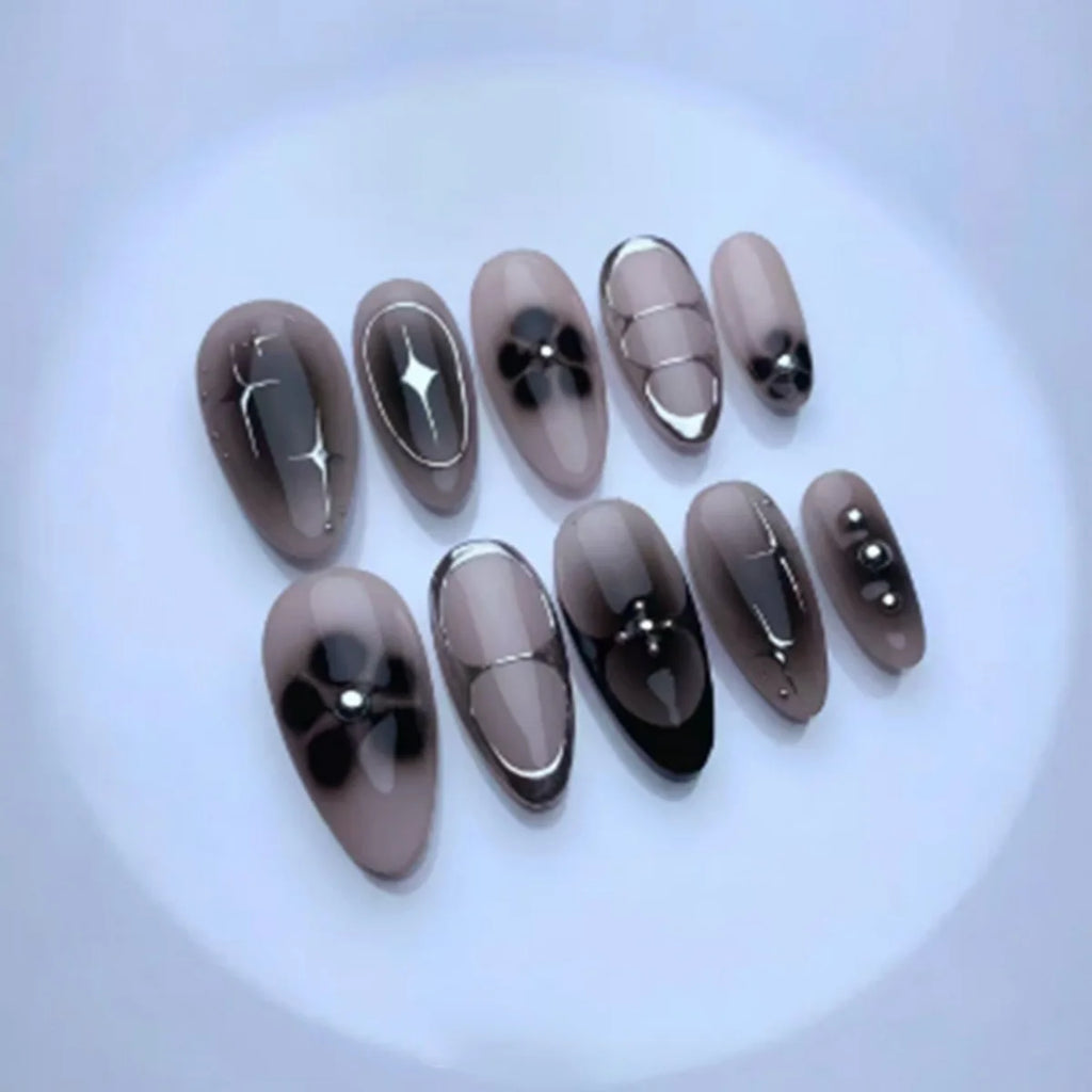 STORESDE 24Pcs Black Y2k Long False Nails with Almond Head Design Cat's Eye Silver Stripe Pattern Press on Fake Nails Wearable Nail Tips