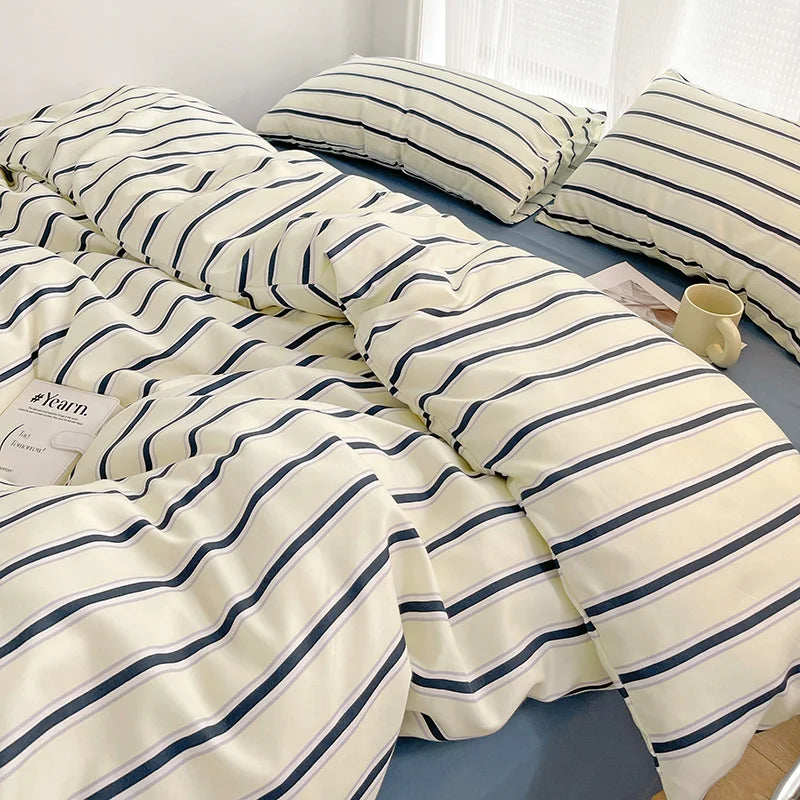STORESDE Simple Red and Blue Striped Duvet Cover and Four Piece Bed Sheet Set with Washed Cotton Bedding on the Bed