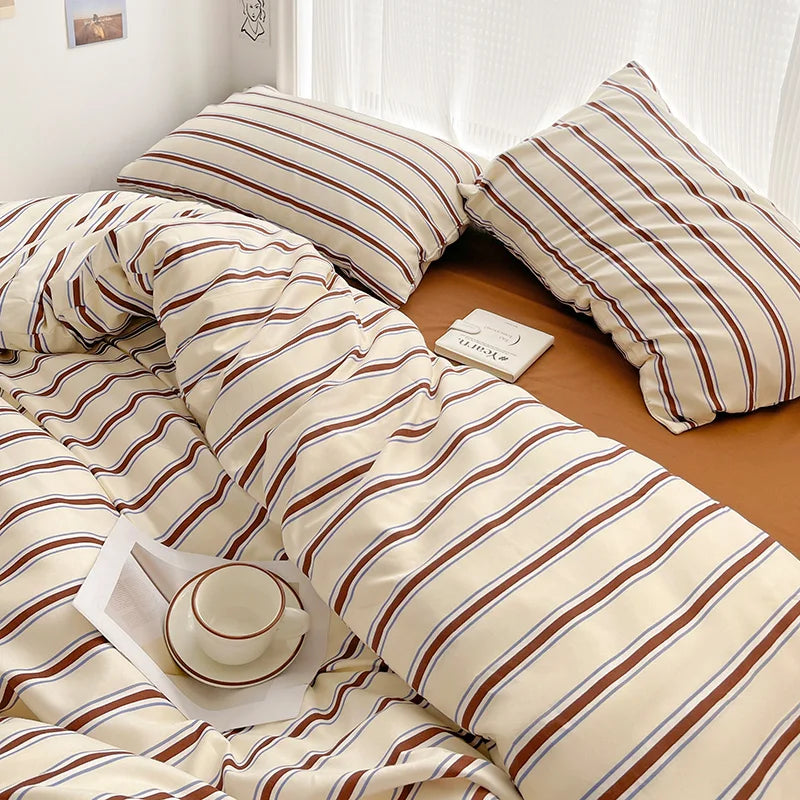 STORESDE Simple Red and Blue Striped Duvet Cover and Four Piece Bed Sheet Set with Washed Cotton Bedding on the Bed
