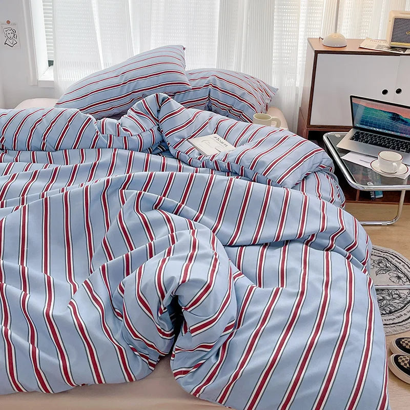 STORESDE Simple Red and Blue Striped Duvet Cover and Four Piece Bed Sheet Set with Washed Cotton Bedding on the Bed
