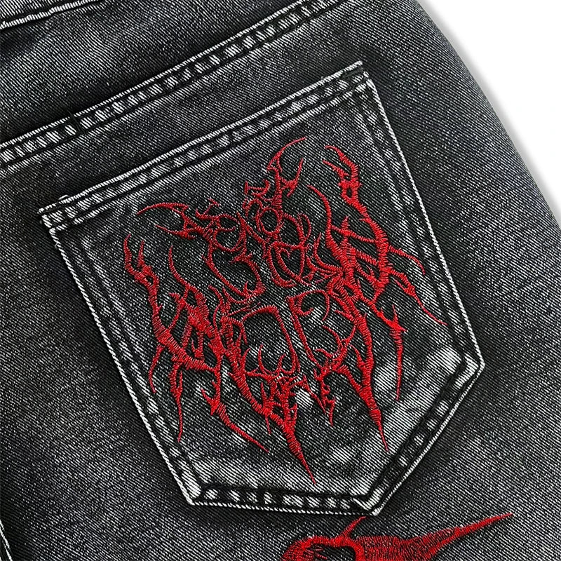 STORESDE European and American style heavy industry thorn red embroidered jeans men's washed black personalized street trousers