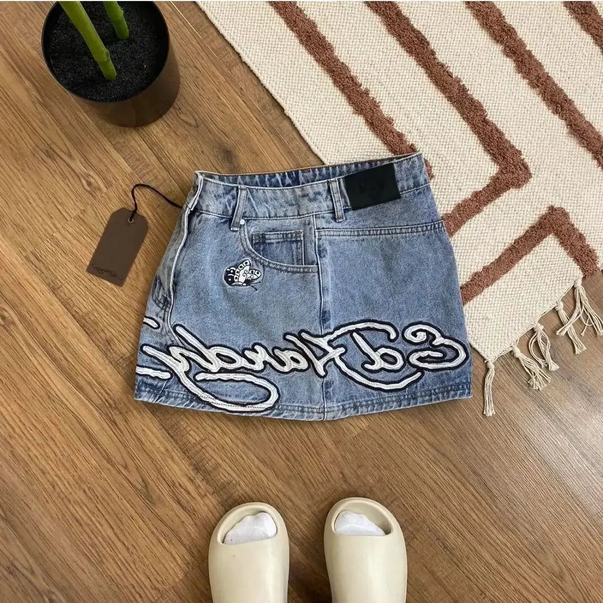STORESDE Y2K Street Vintage is a fashionable short skirt Harajuku gothic hip hop letter print vintage blue denim skirt