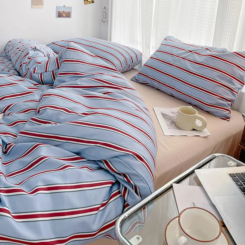 STORESDE Simple Red and Blue Striped Duvet Cover and Four Piece Bed Sheet Set with Washed Cotton Bedding on the Bed