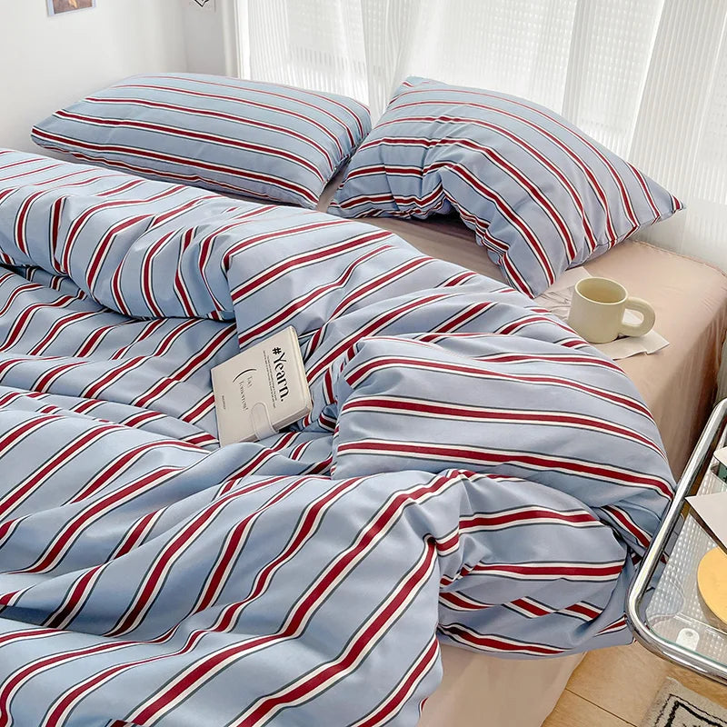 STORESDE Simple Red and Blue Striped Duvet Cover and Four Piece Bed Sheet Set with Washed Cotton Bedding on the Bed