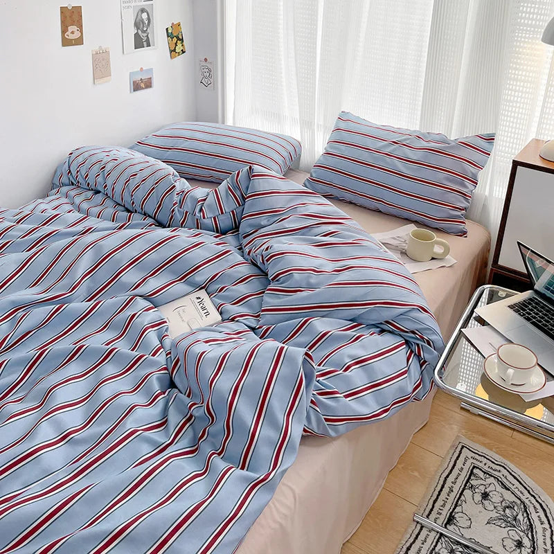 STORESDE Simple Red and Blue Striped Duvet Cover and Four Piece Bed Sheet Set with Washed Cotton Bedding on the Bed